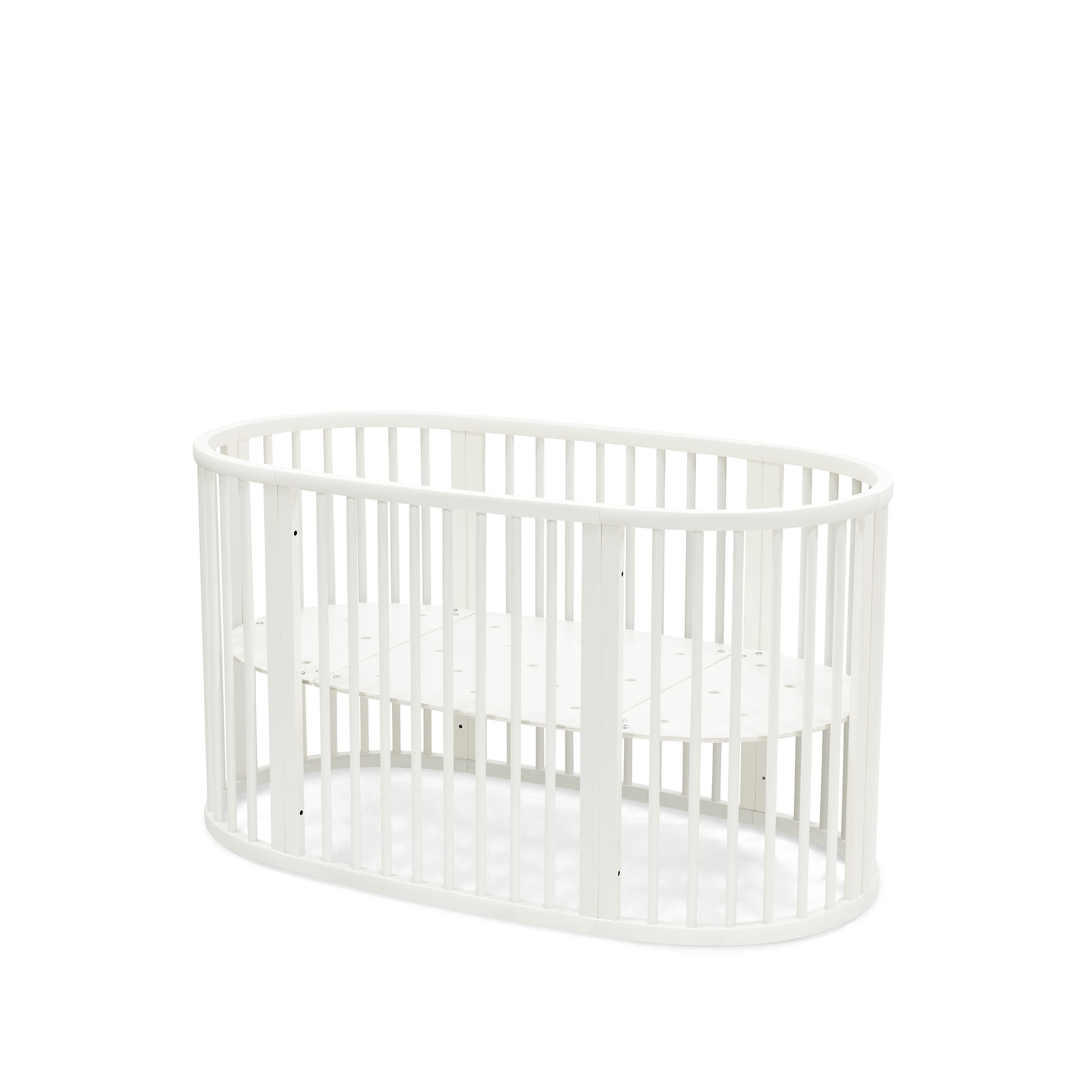 Stokke® Sleepi™ Bed. White. Closed. Angled view.